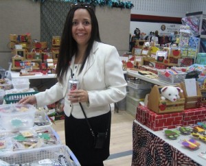 A teacher (Linda) browsing through some magnets in our booth at the Martin High School Fall Craft Show (Photo taken by author)